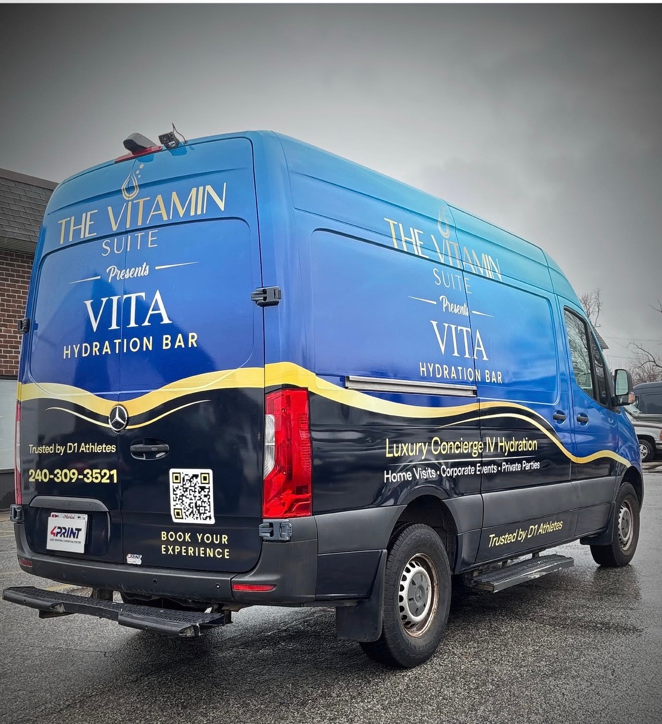 The Vitamin Suite branded concierge wellness van — rear view showing Luxury Concierge IV Hydration branding